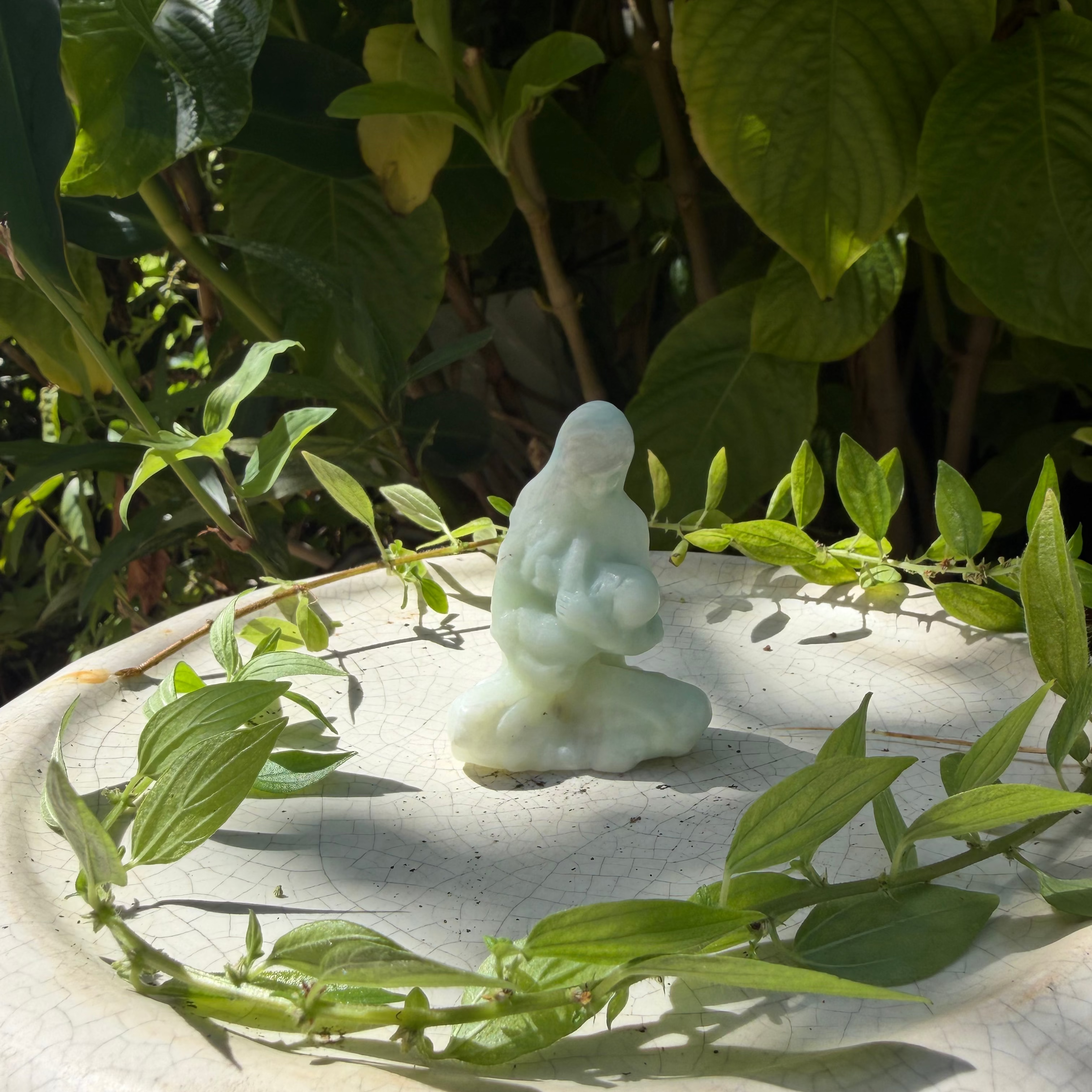 Mother Holding Baby Carving