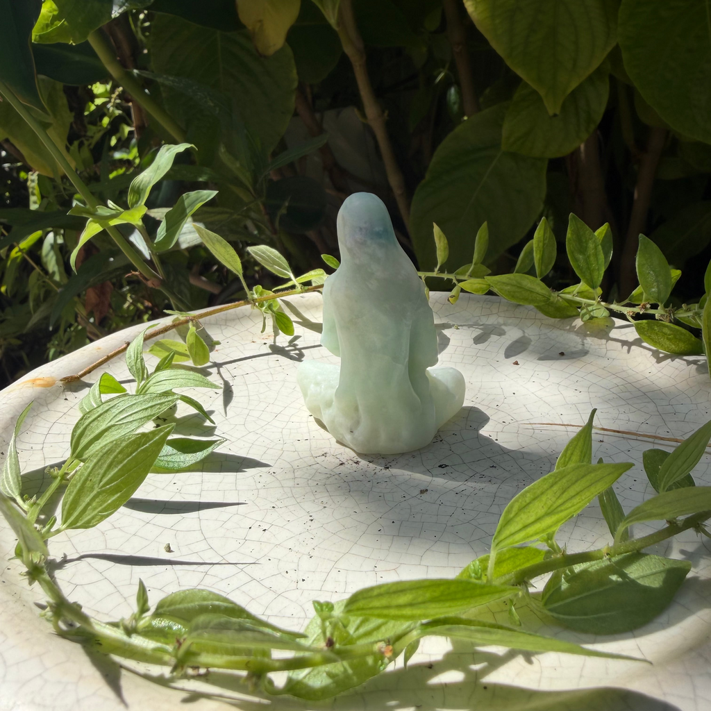 Mother Holding Baby Carving