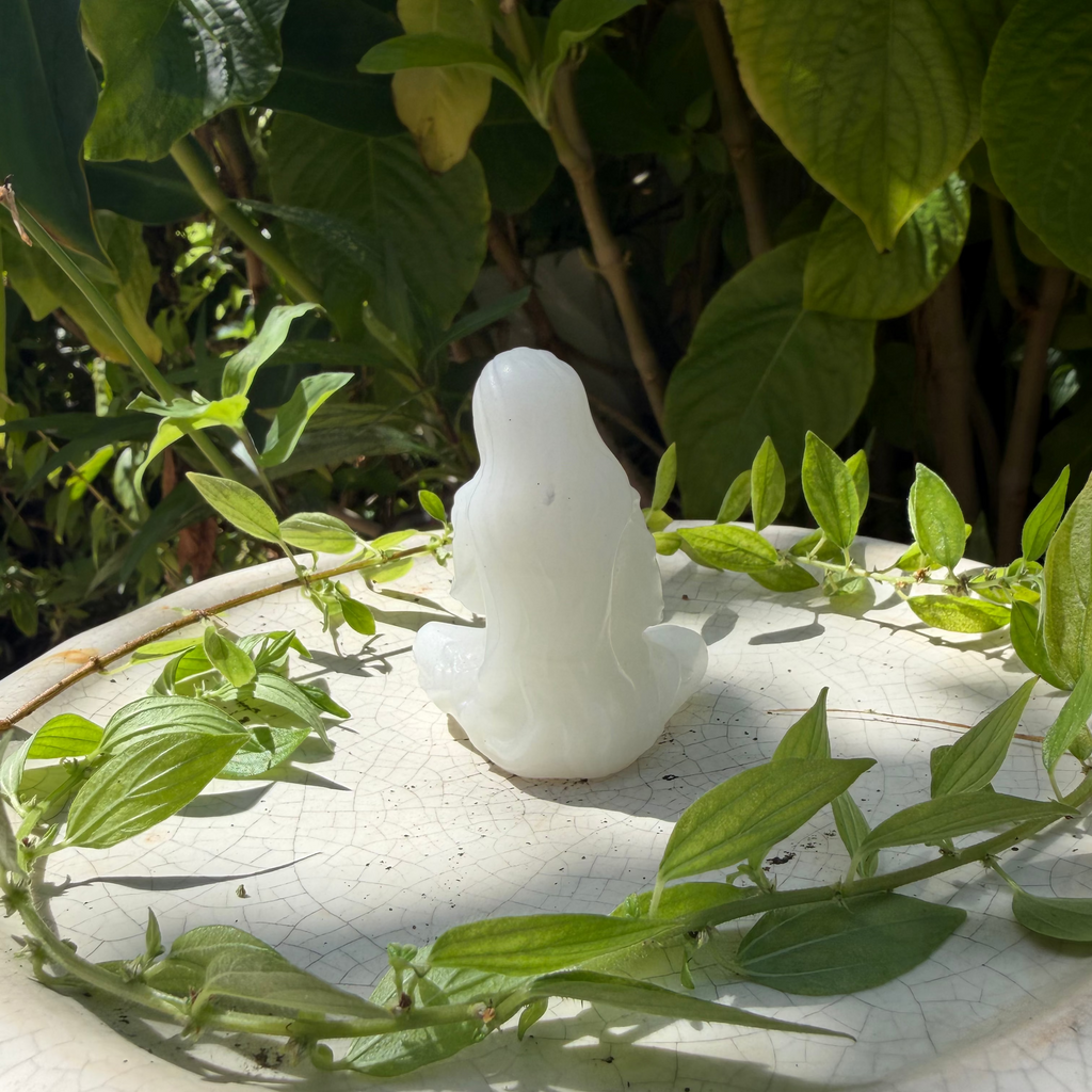 Mother Holding Baby Carving